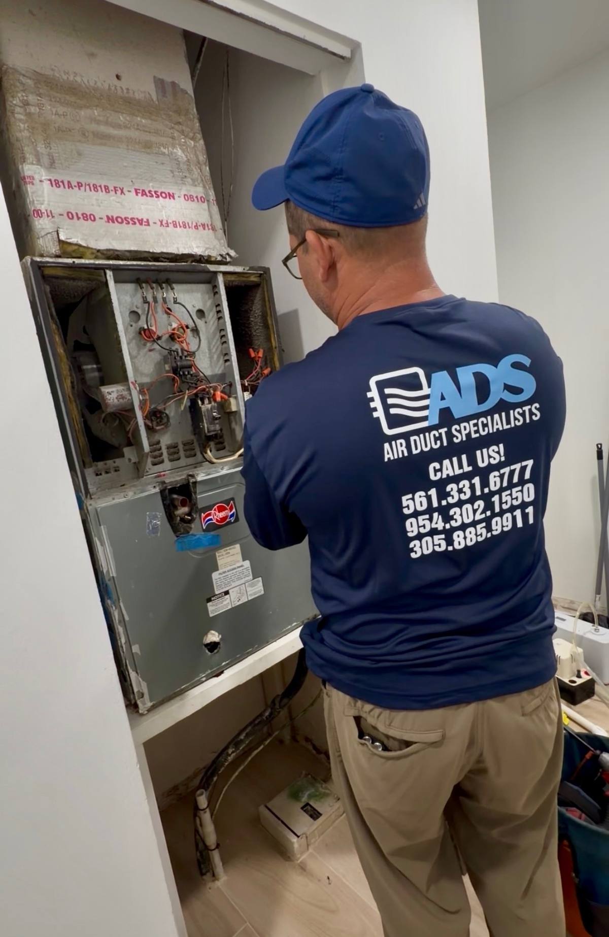 Air Duct Specialists LLC AC maintenance service on Rheem unit Miami FL