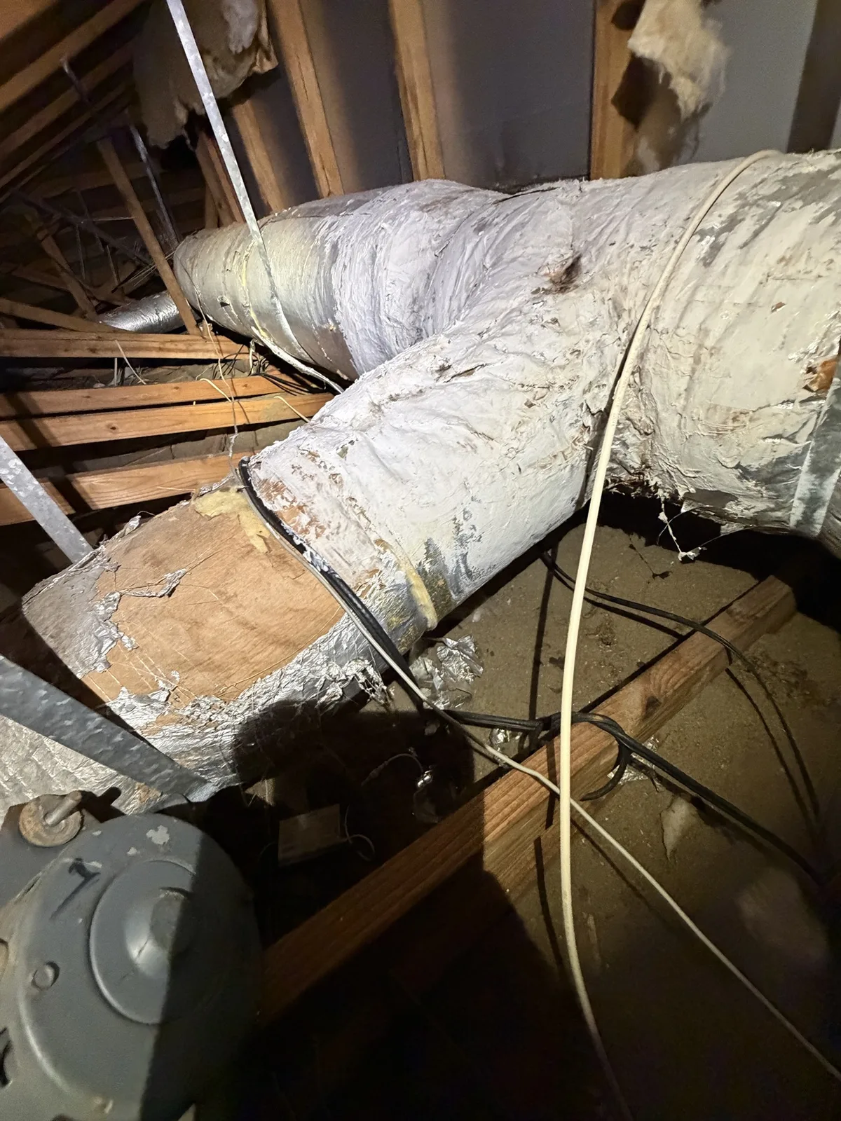Damaged ductwork in a Boca Raton attic — Air Duct Specialists LLC