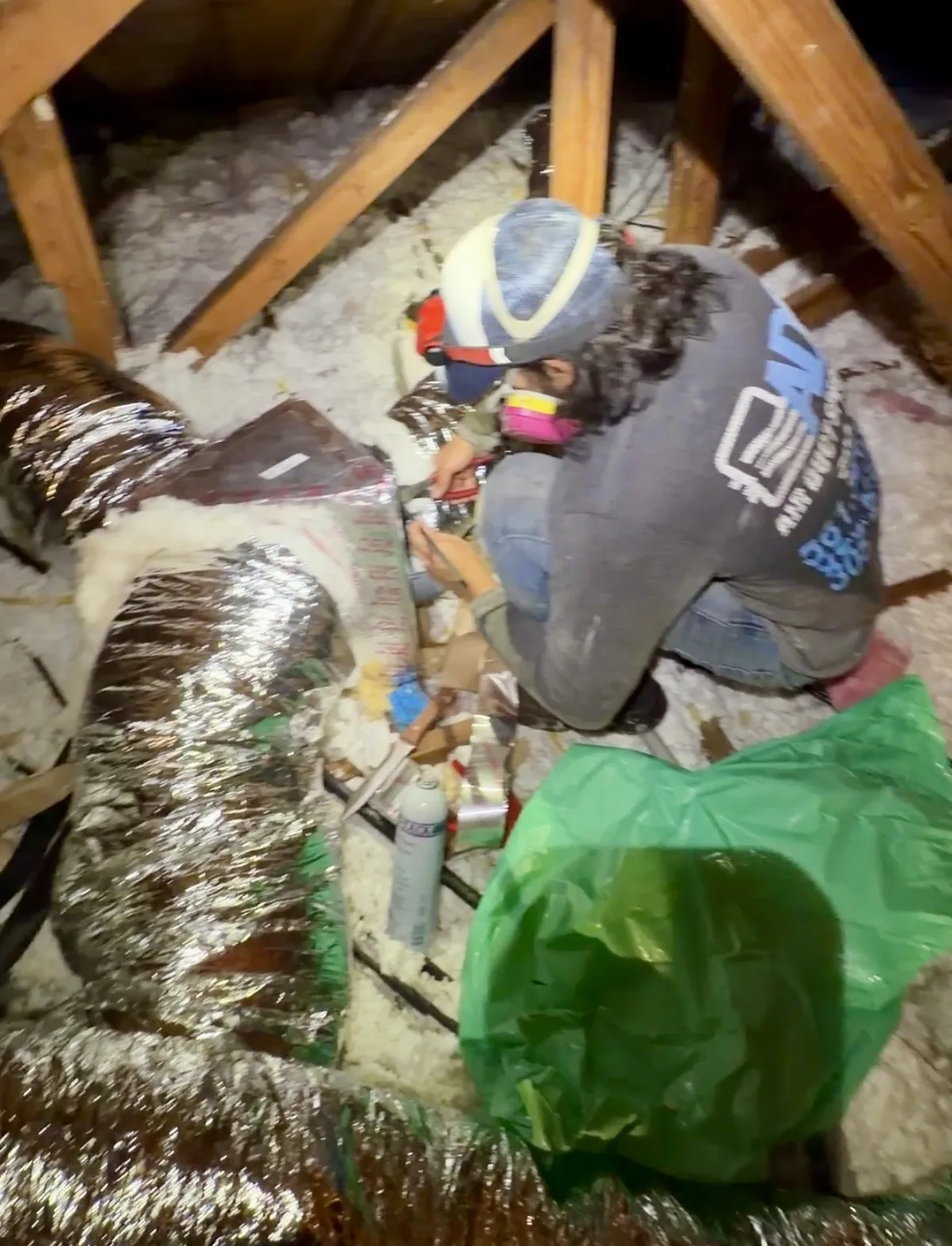 Technician sealing a new duct connection in a Plantation attic — Air Duct Specialists LLC
