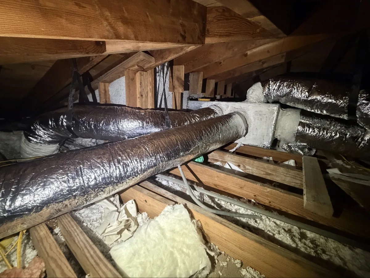 New R-8 insulated ductwork installed in a South Florida attic — Air Duct Specialists LLC
