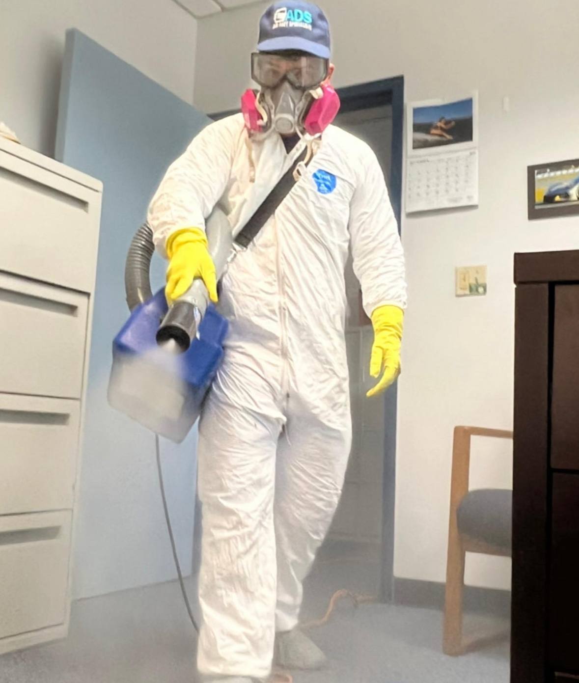 Professional air sanitation technician full PPE equipment Miami FL — Air Duct Specialists LLC